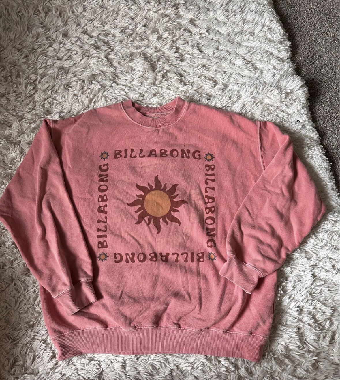 Billabong sweatshirt. So I look like I can surf